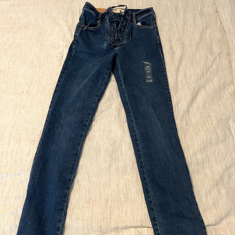 Never worn Garage jeans !